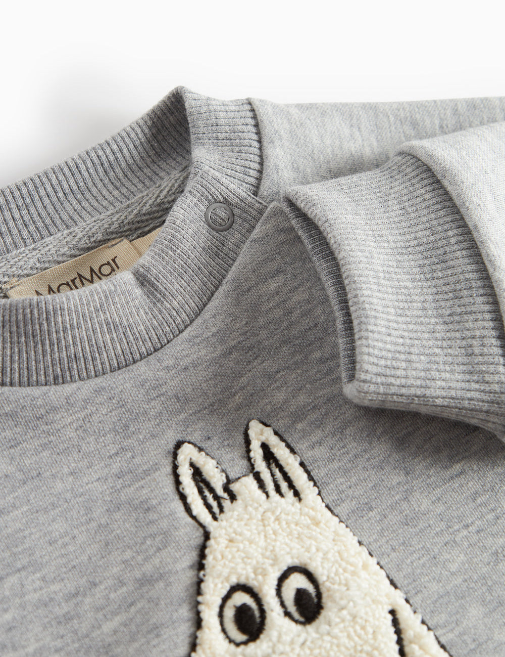 Grå børnetrøje med Moomin print foran