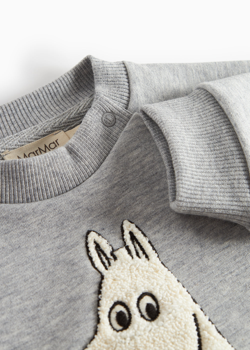 Grå børnetrøje med Moomin print foran