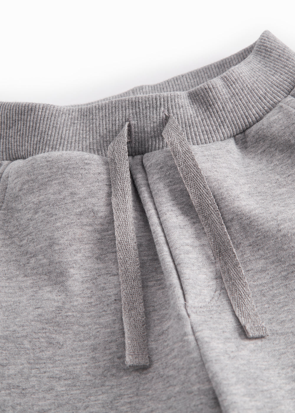 Gray sweatpants for baby with Moomin print, elastic and drawstring.