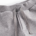 Gray sweatpants for baby with Moomin print, elastic and drawstring.