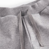 Gray sweatpants for baby with Moomin print, elastic and drawstring.