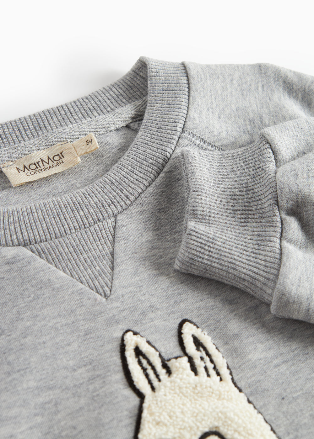 Grå børnetrøje med Moomin print foran