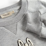 Grå børnetrøje med Moomin print foran