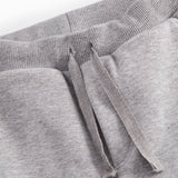 Grå sweatbukser til børn med Moomin print, elastik og bindebånd