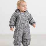 Children's jumpsuit in dark gray with hood and all-over pattern
