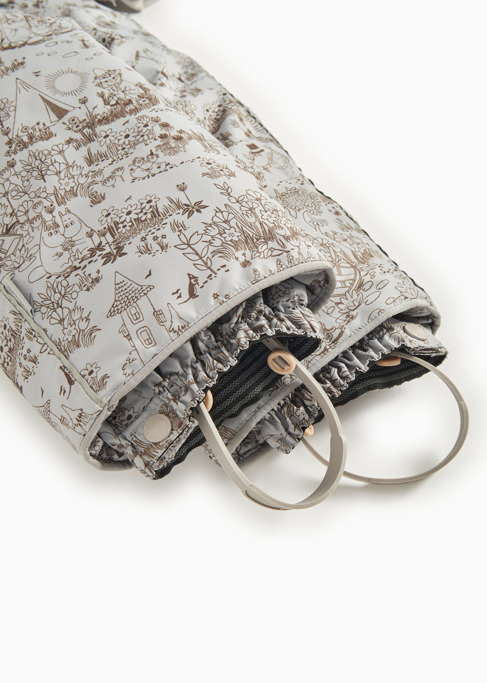 Light gray jumpsuit with hood and pattern, zipper and flap edge at the opening