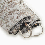 Light gray jumpsuit with hood and pattern, zipper and flap edge at the opening
