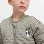 Children's green quilted jacket with Moomin print