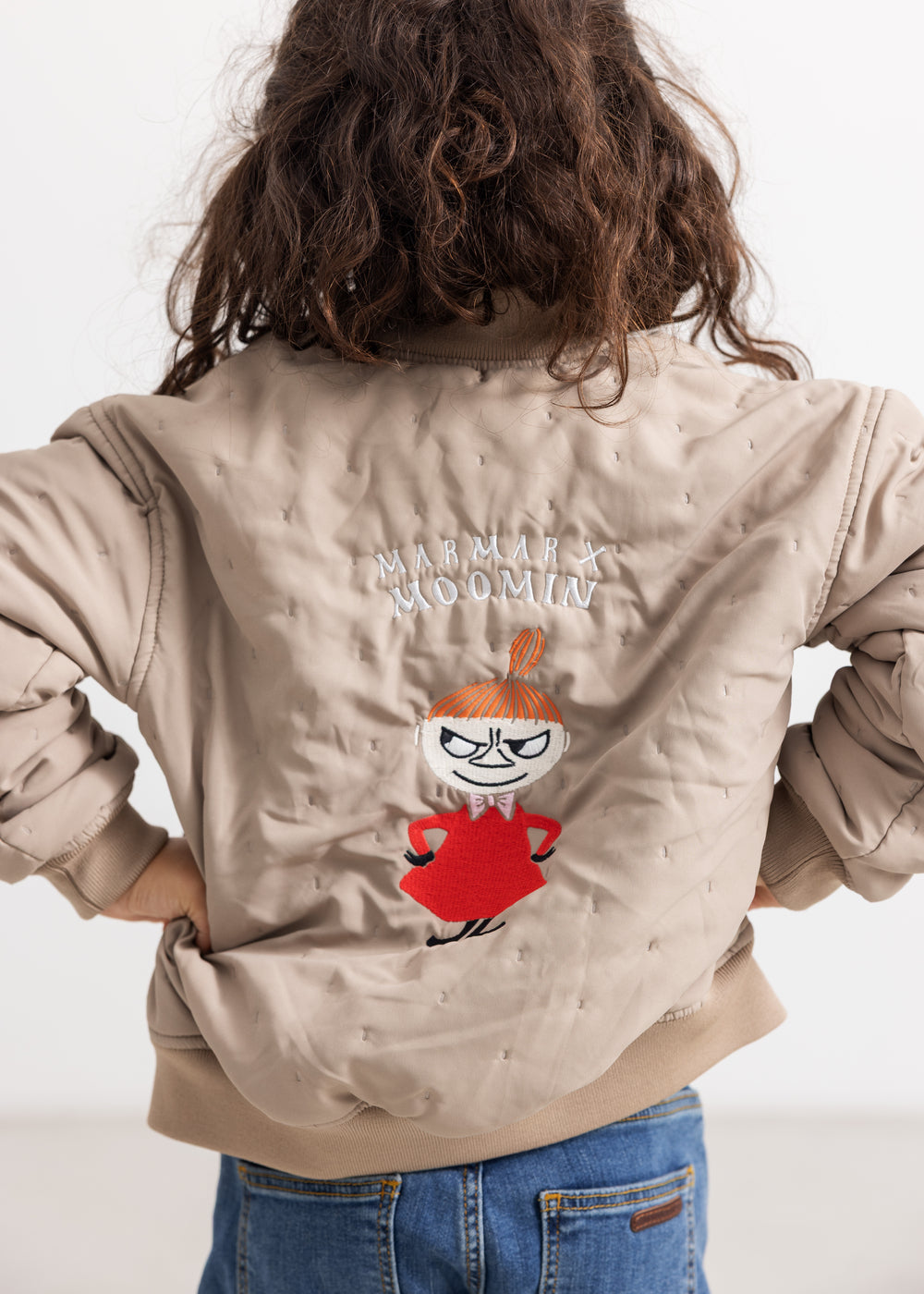 Light gray insulated jacket with hood and large back print