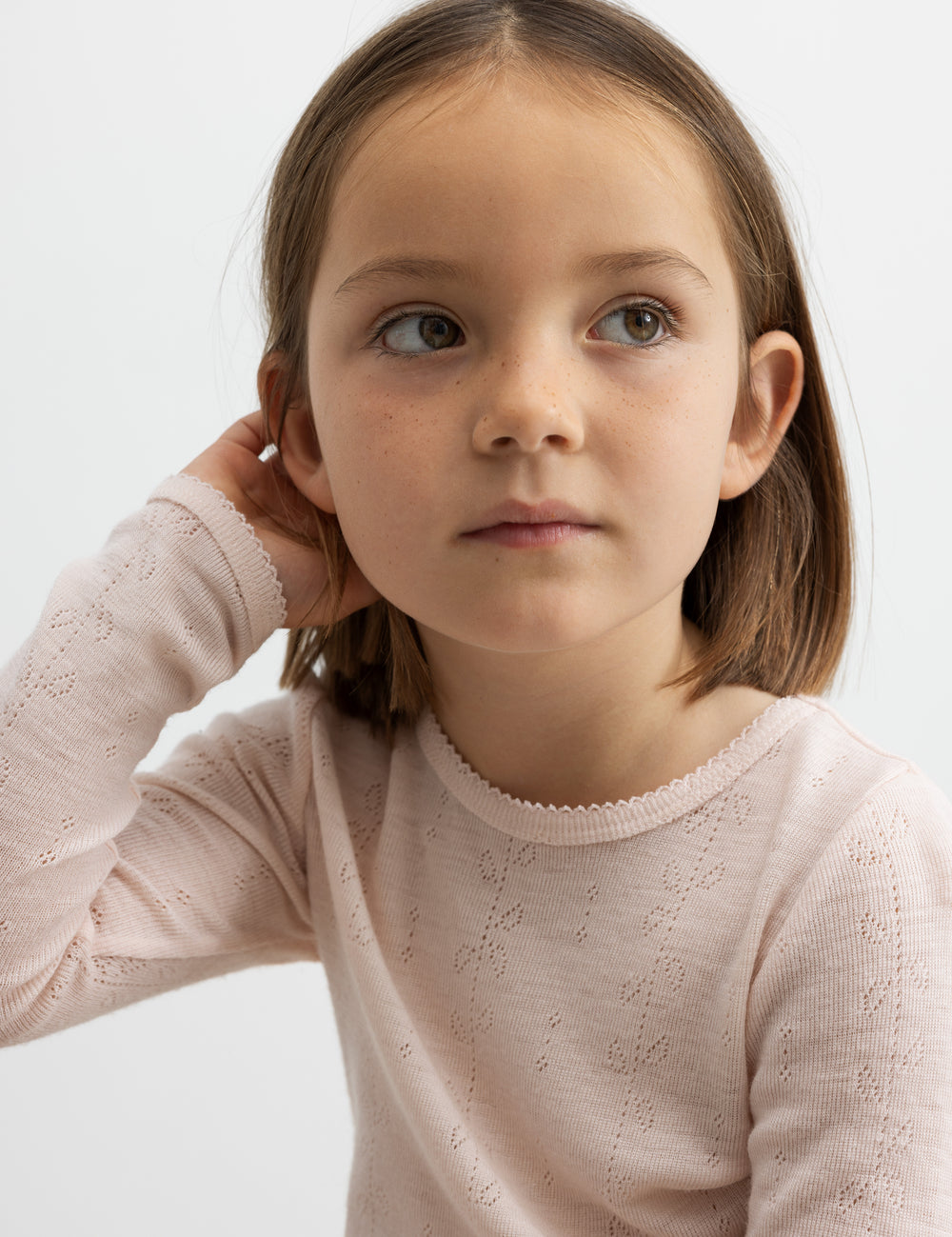Wearing a bright red shirt in merino.
