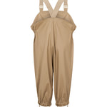 beige regnbukser med seler og fodstropper, set bagfra