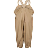 beige regnbukser med seler og fodstropper, set bagfra