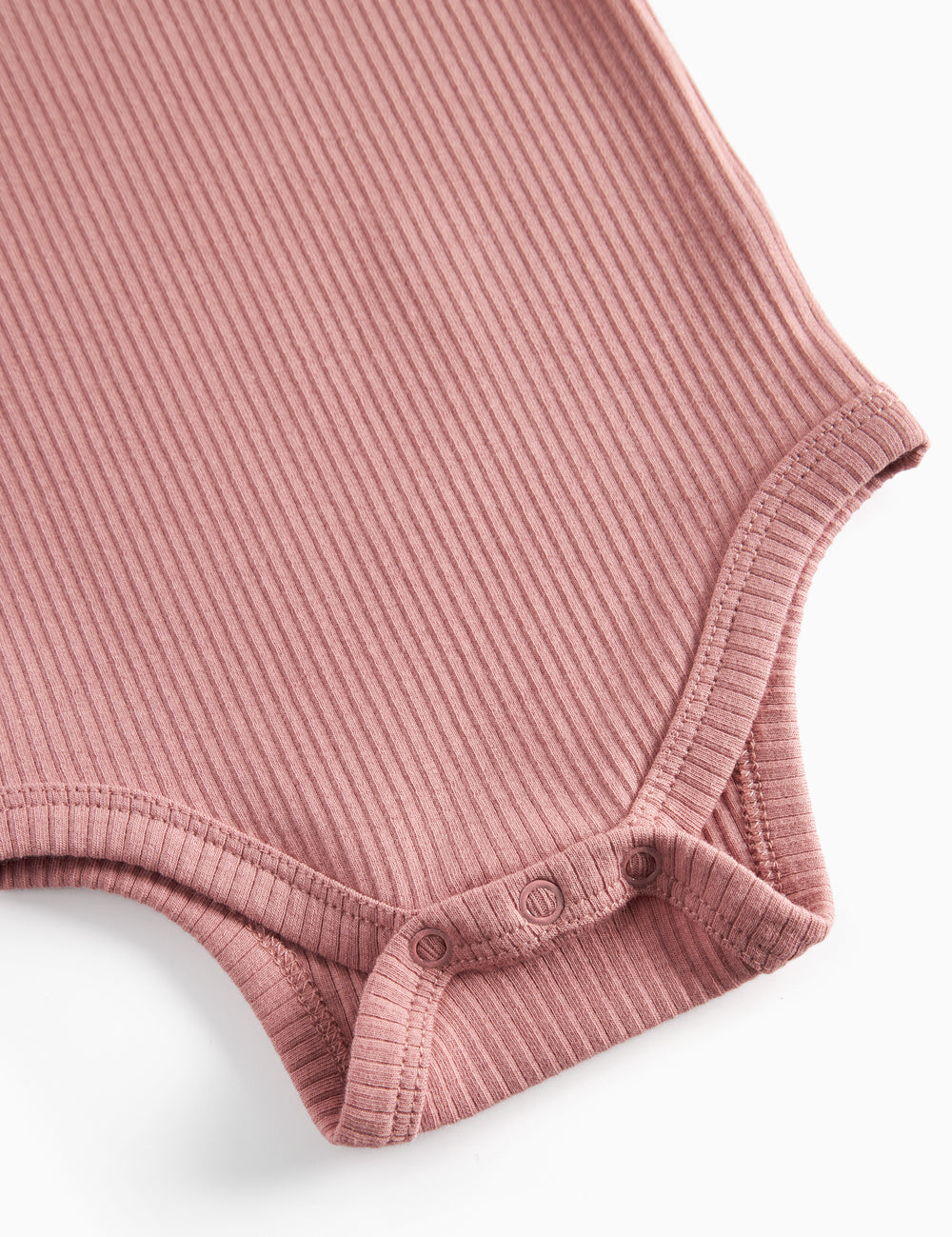 Lyserød ribstrikket body med lange ærmer til børn
