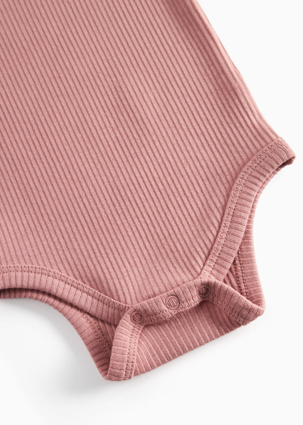 Lyserød ribstrikket body med lange ærmer til børn