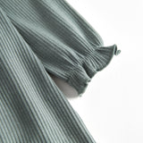 Grøn kjole med lange ærmer og flæser til børn