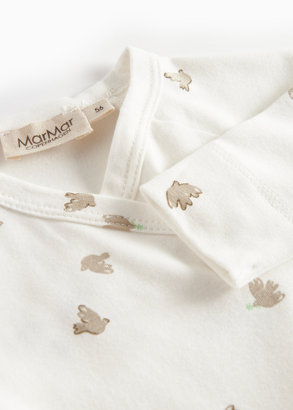 Langærmet bodystocking til nyfødte med slå-om-lukning og fuglmønster