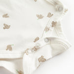 Langærmet bodystocking til nyfødte med slå-om-lukning og fuglmønster