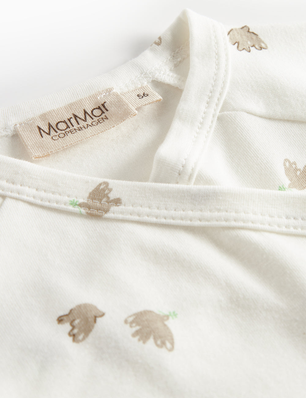 Long-sleeved blouse for newborns with wrap-around closure and bird pattern