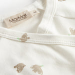 Langærmet bluse til nyfødte med slå-om-lukning og fuglmønster