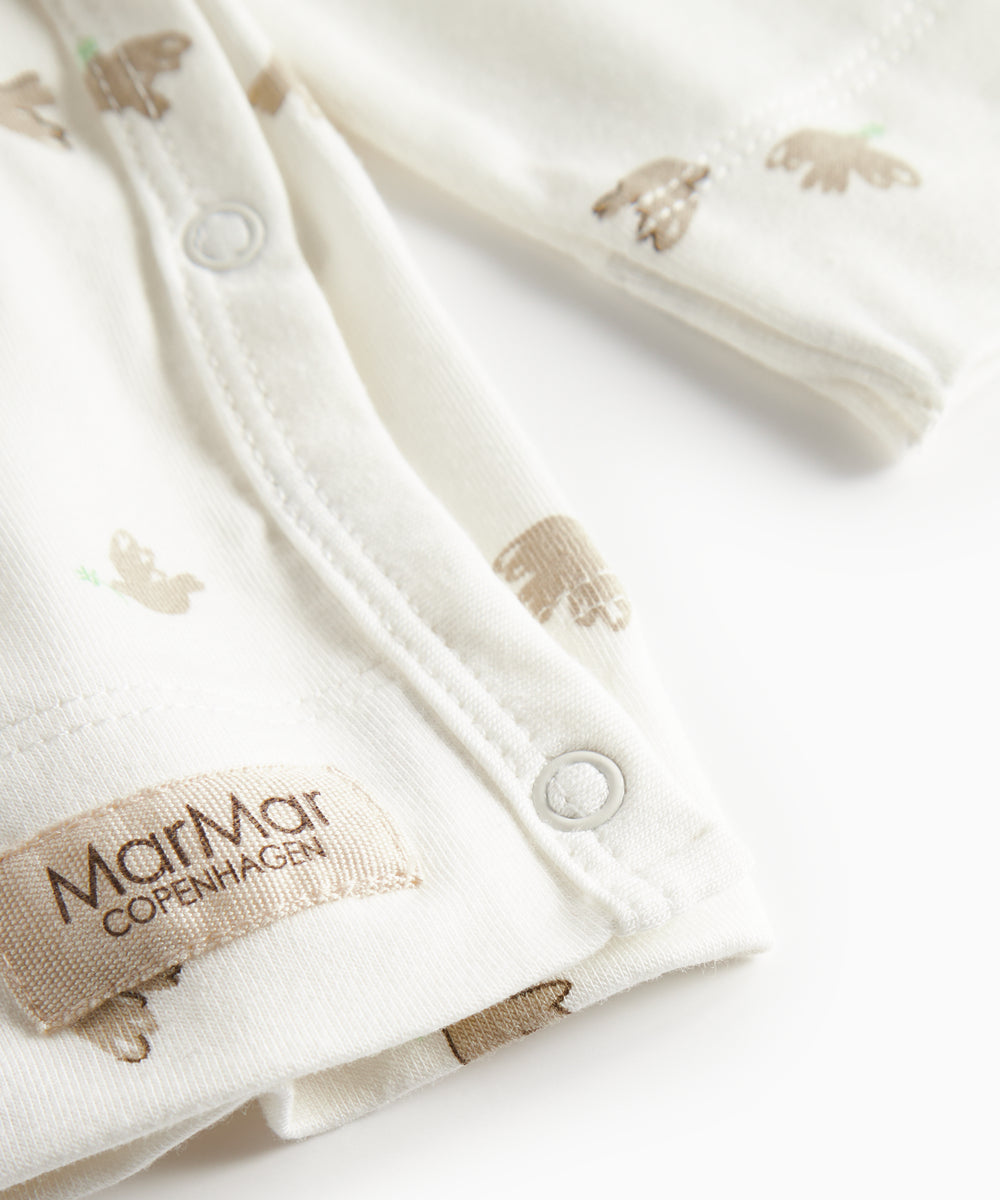 Langærmet bluse til nyfødte med slå-om-lukning og fuglmønster