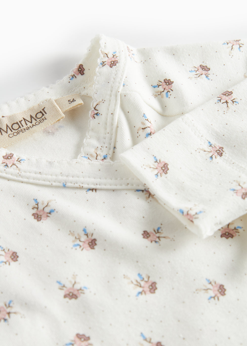 Langærmet bluse til nyfødte med slå-om-lukning og blomstermønster