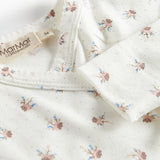 Langærmet bluse til nyfødte med slå-om-lukning og blomstermønster