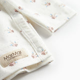 Langærmet bluse til nyfødte med slå-om-lukning og blomstermønster