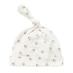 Blød babyhue med mønsterprint og knude på toppen