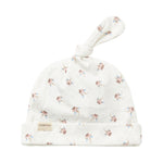 Blød babyhue med mønsterprint og knude på toppen