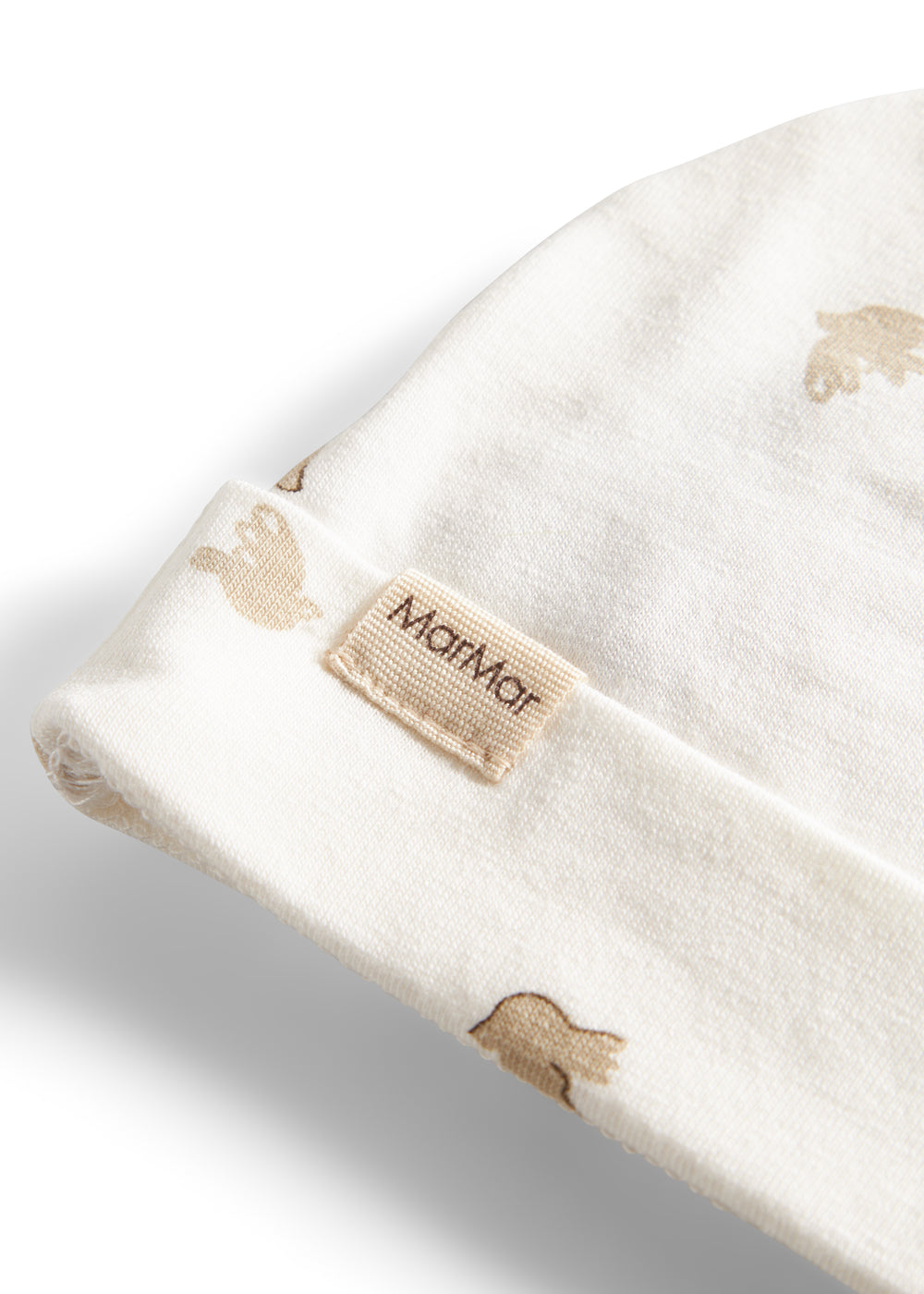 Detaljebillede af babyhue med logo