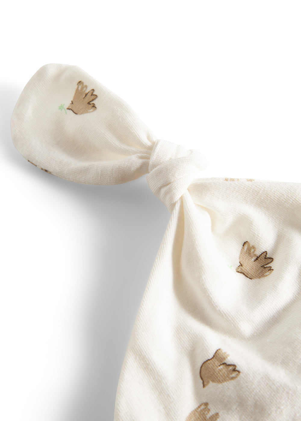 Nærbillede af sløjfe i blødt mønstret stof