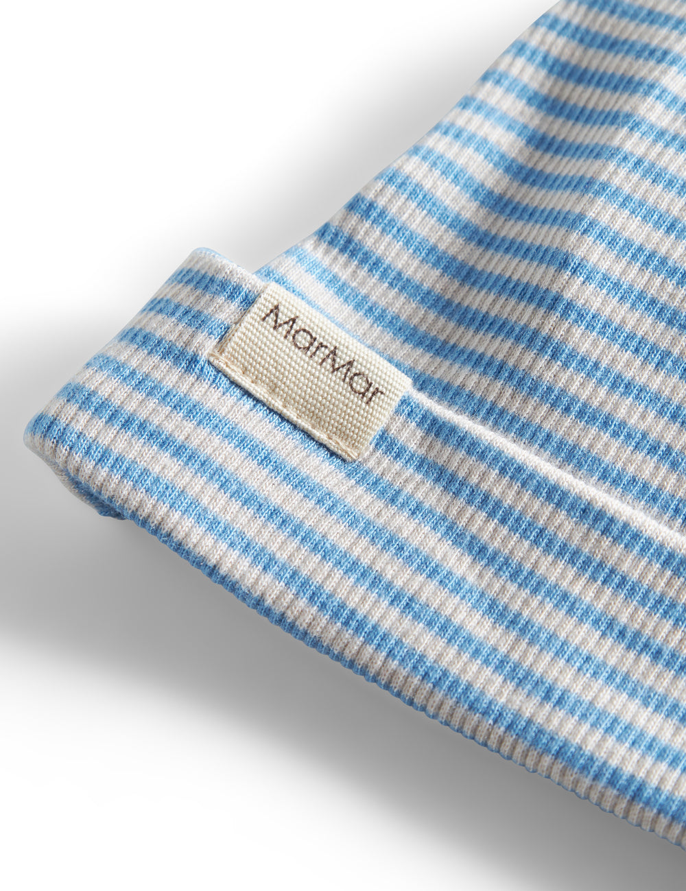 Blue and white striped baby hat with knot on top