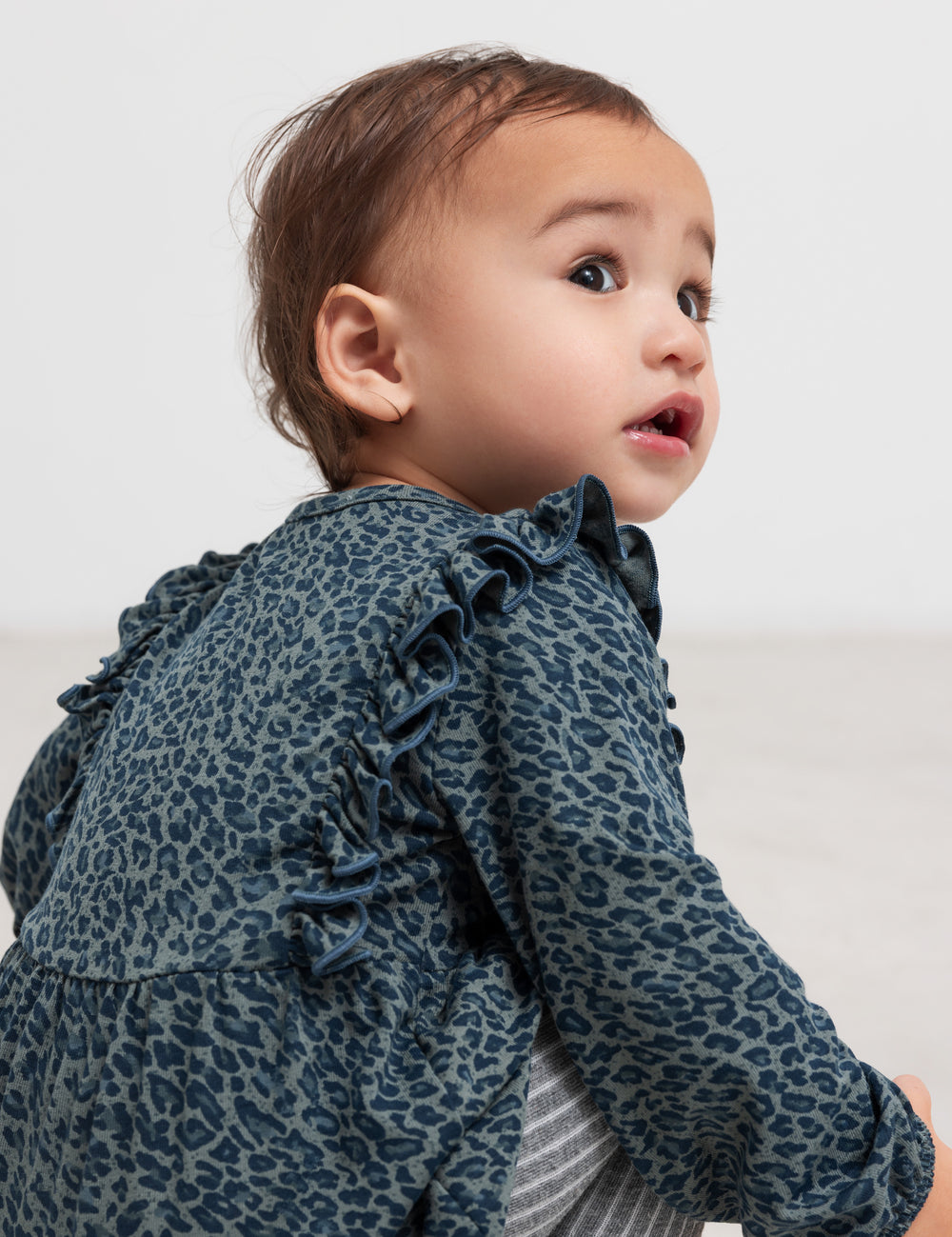 Baby green leopard print bodysuit with long sleeves and ruffles