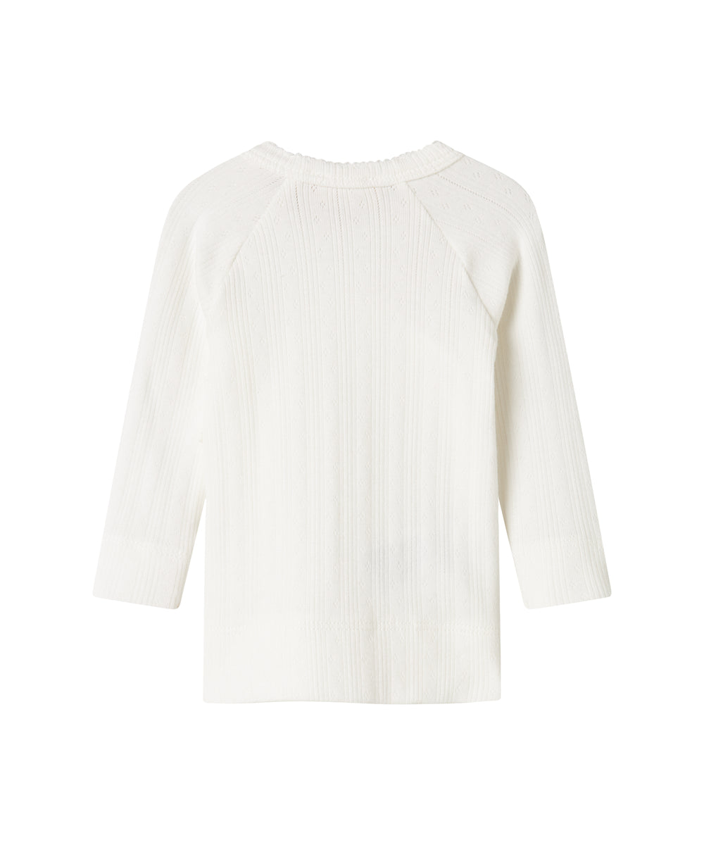 Hvid pointelle slå-om bluse til baby med lange ærmer