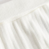 Hvide pointelle bukser til baby