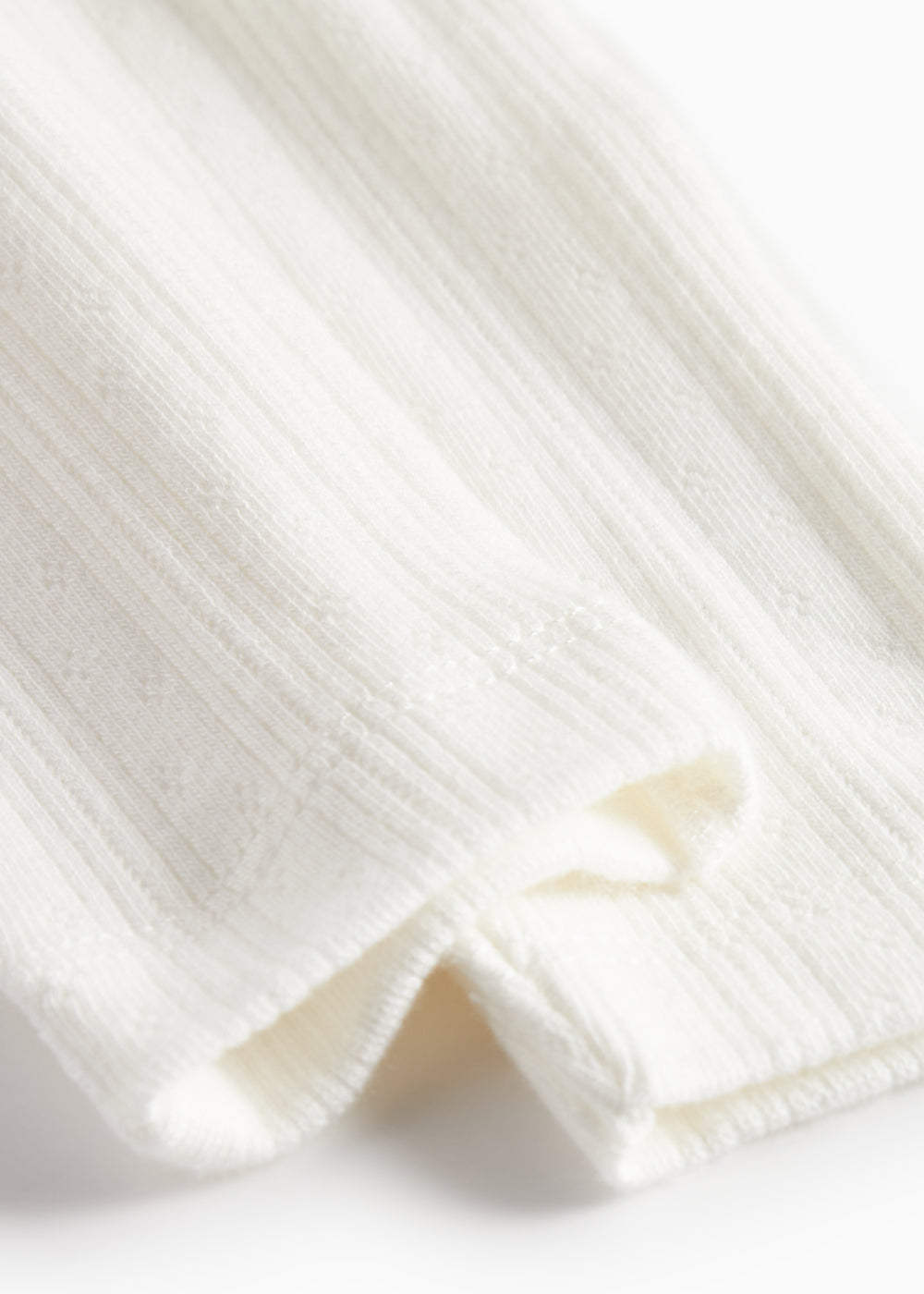 Hvide pointelle bukser til baby