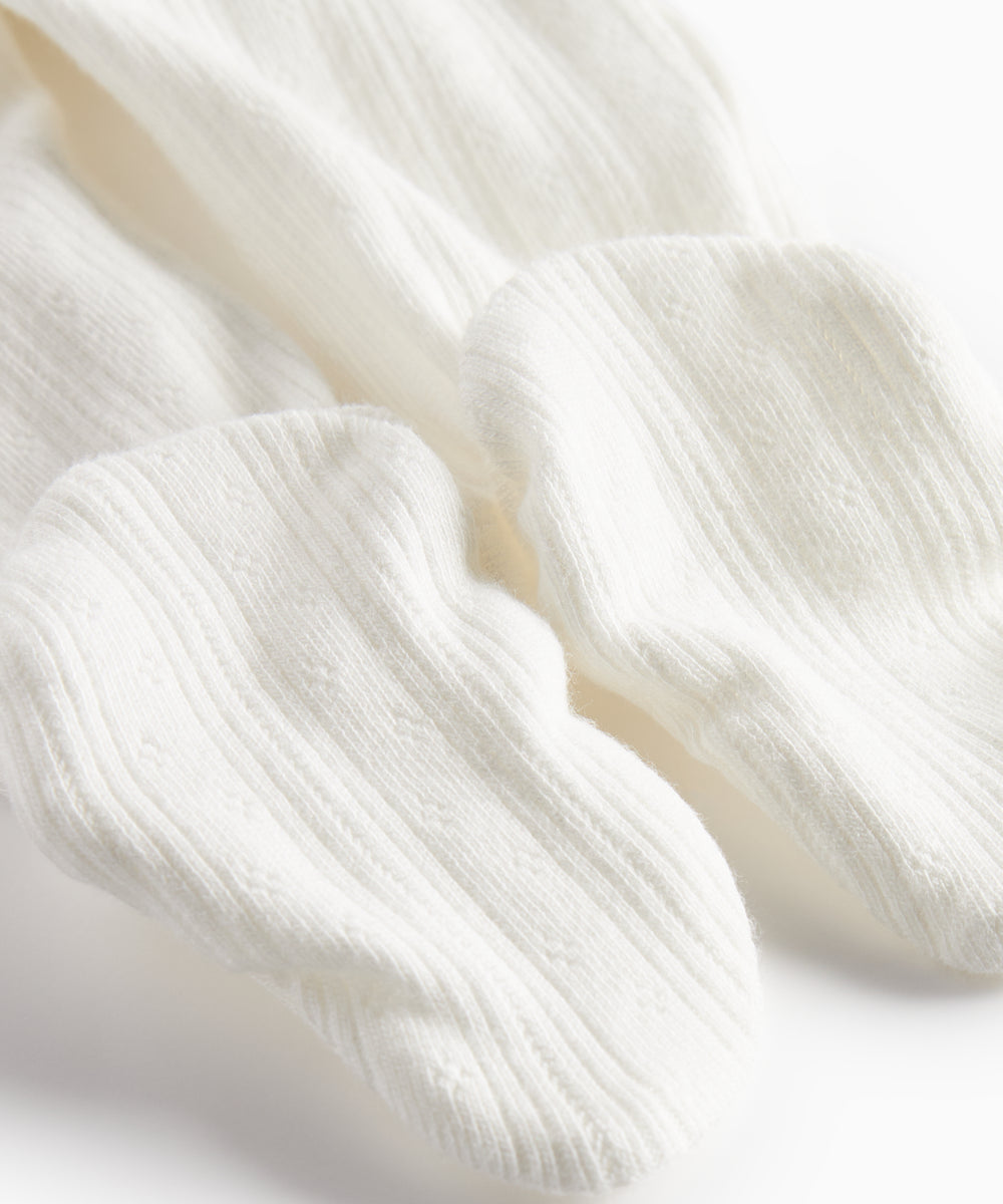 Hvide pointelle bukser med fødder til baby