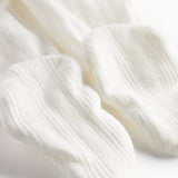 Hvide pointelle bukser med fødder til baby