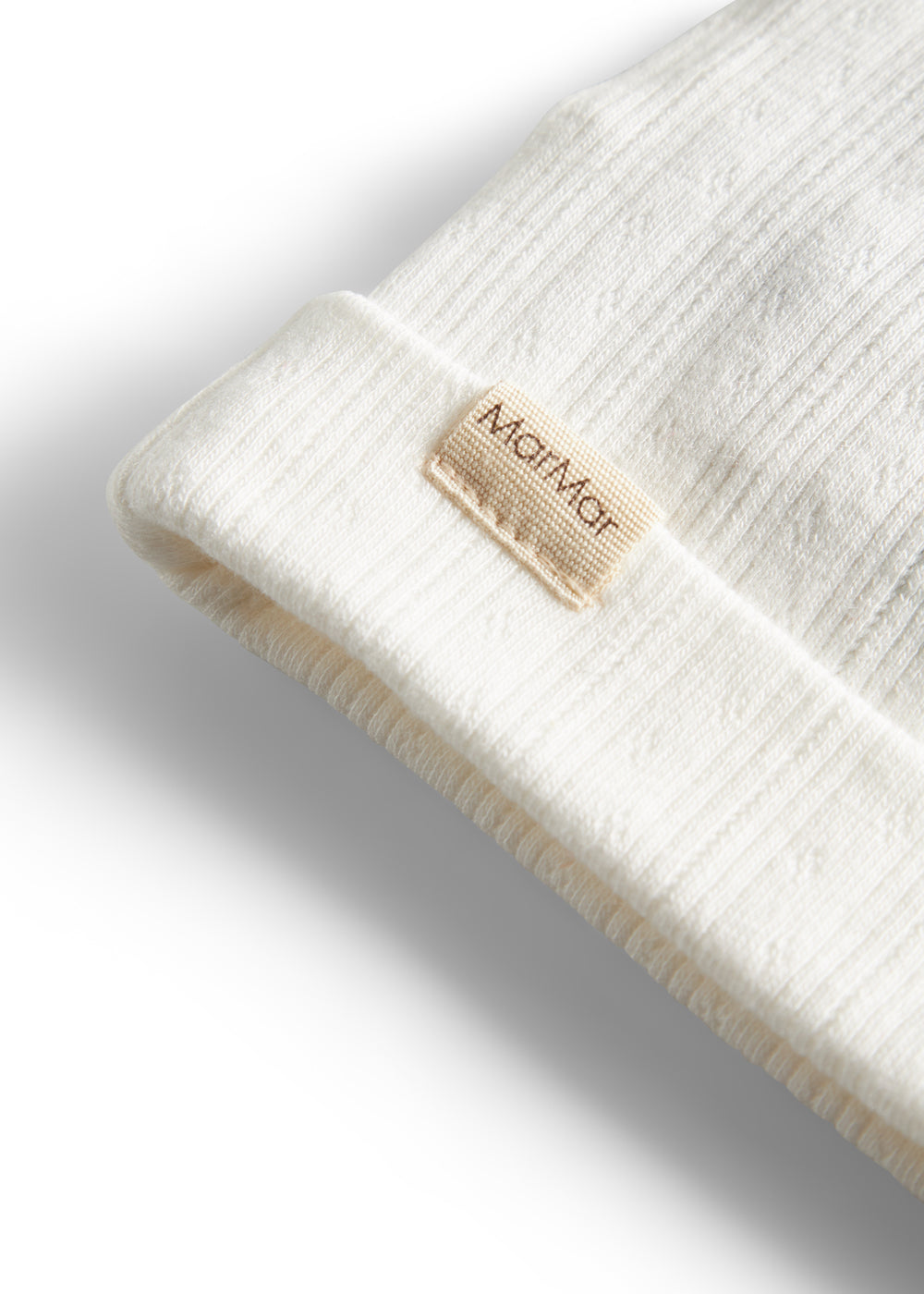 Hvid pointelle hue til baby