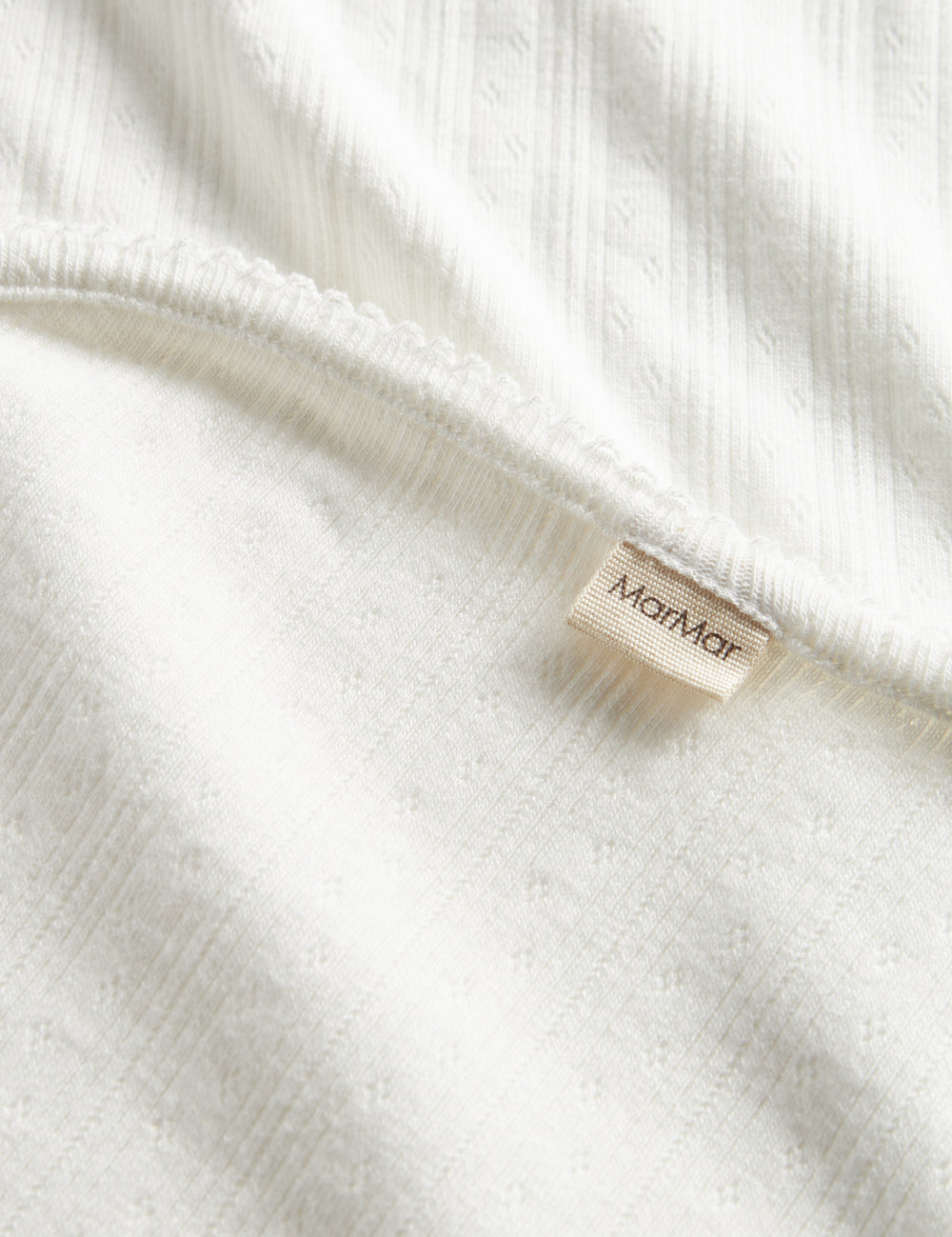 White cotton baby blanket