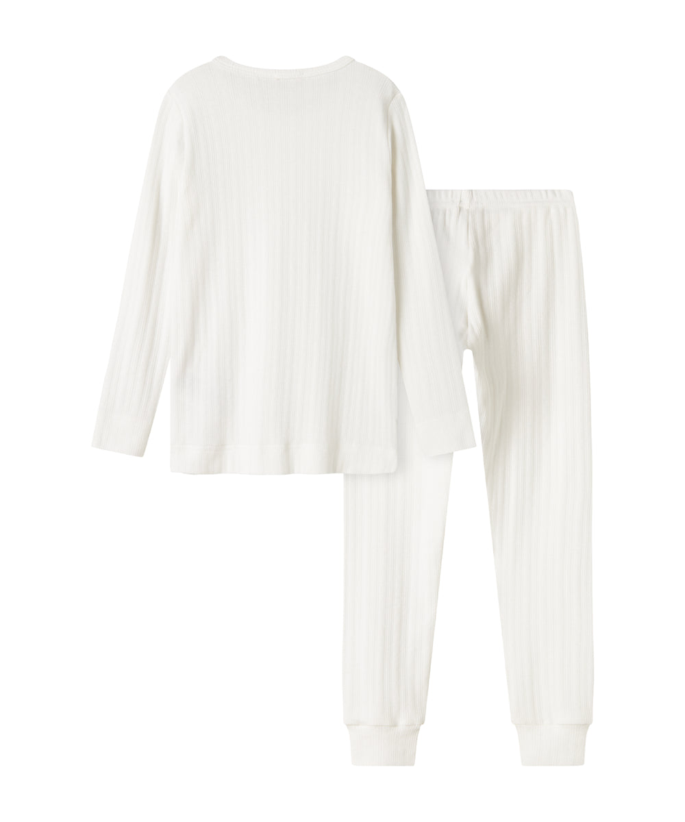 Hvidt pointelle nattøjssæt til børn med langærmet bluse og bukser