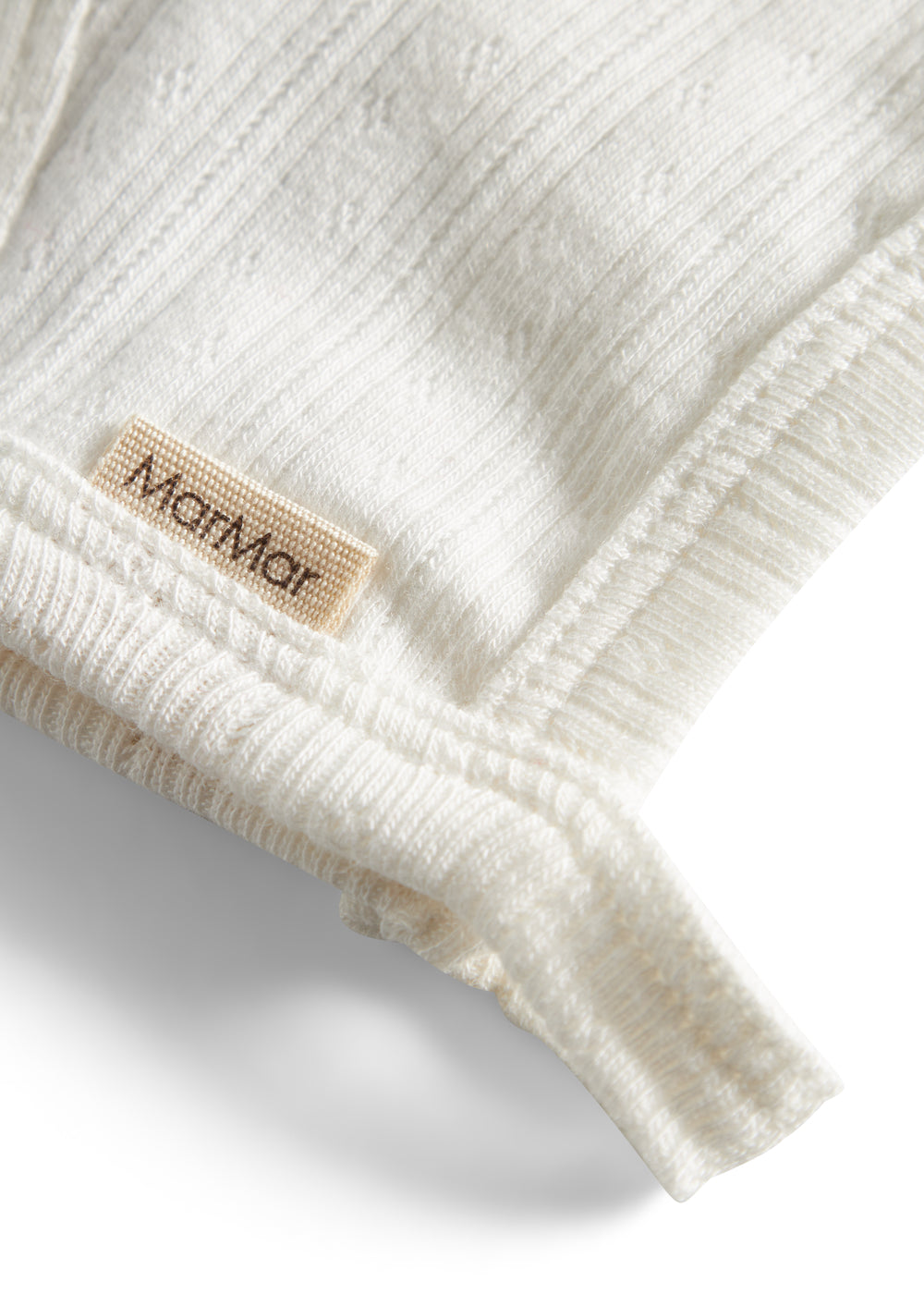 Rosa pointelle hjelm til baby