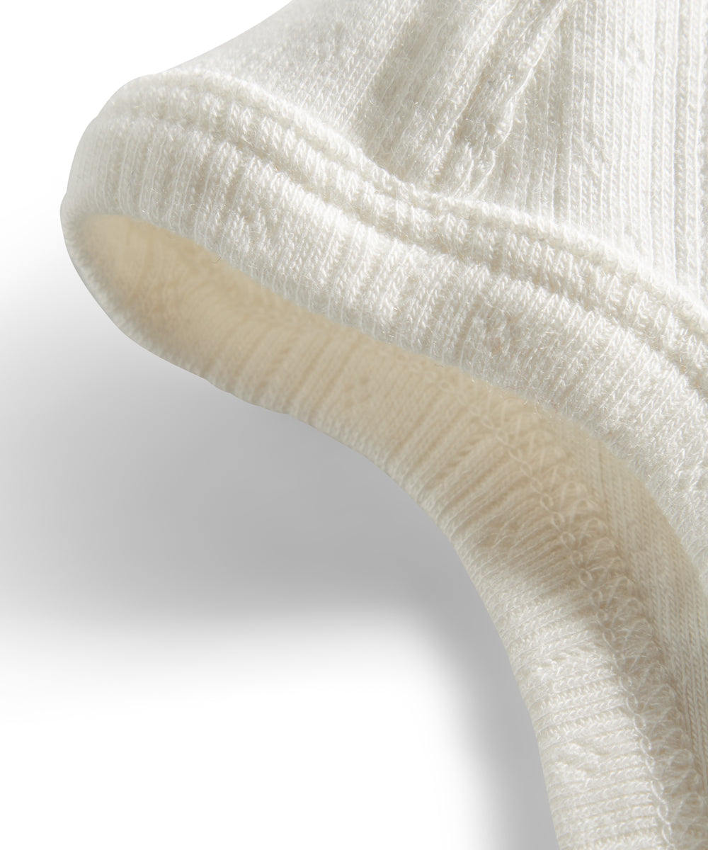 Rosa pointelle hjelm til baby