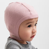 Børn iført rosa pointelle hjelm