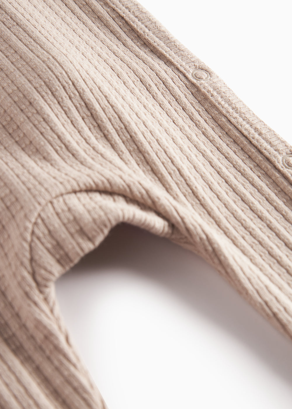 Beige pointelle heldragt med lange ærmer til baby