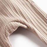 Beige pointelle heldragt med lange ærmer til baby