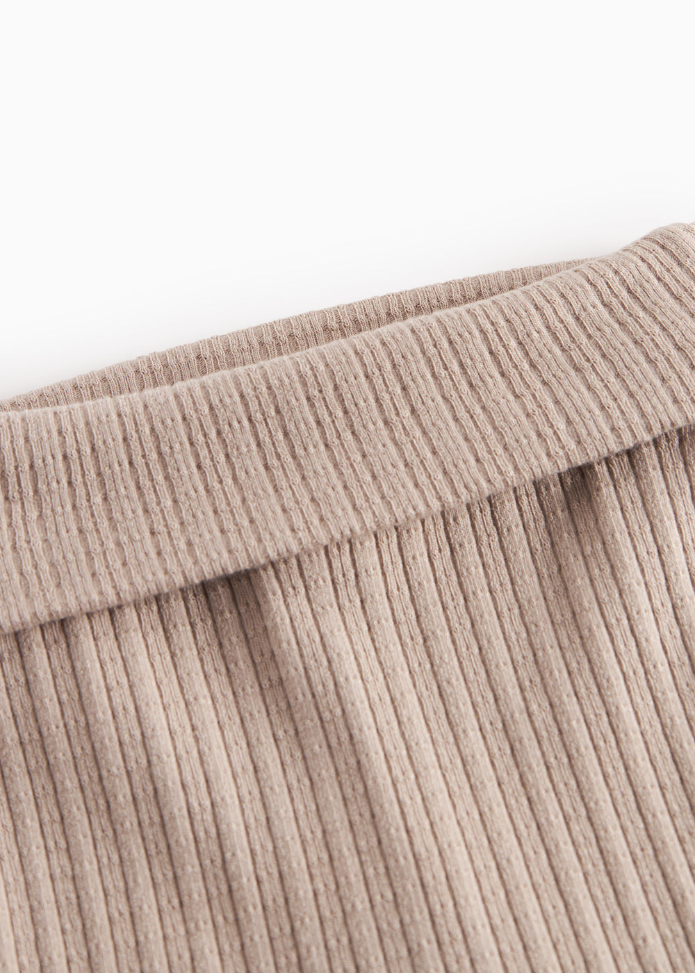 Beige pointelle bukser med fødder til baby