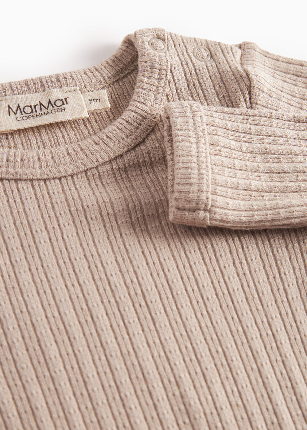 Beige pointelle body med lange ærmer til baby