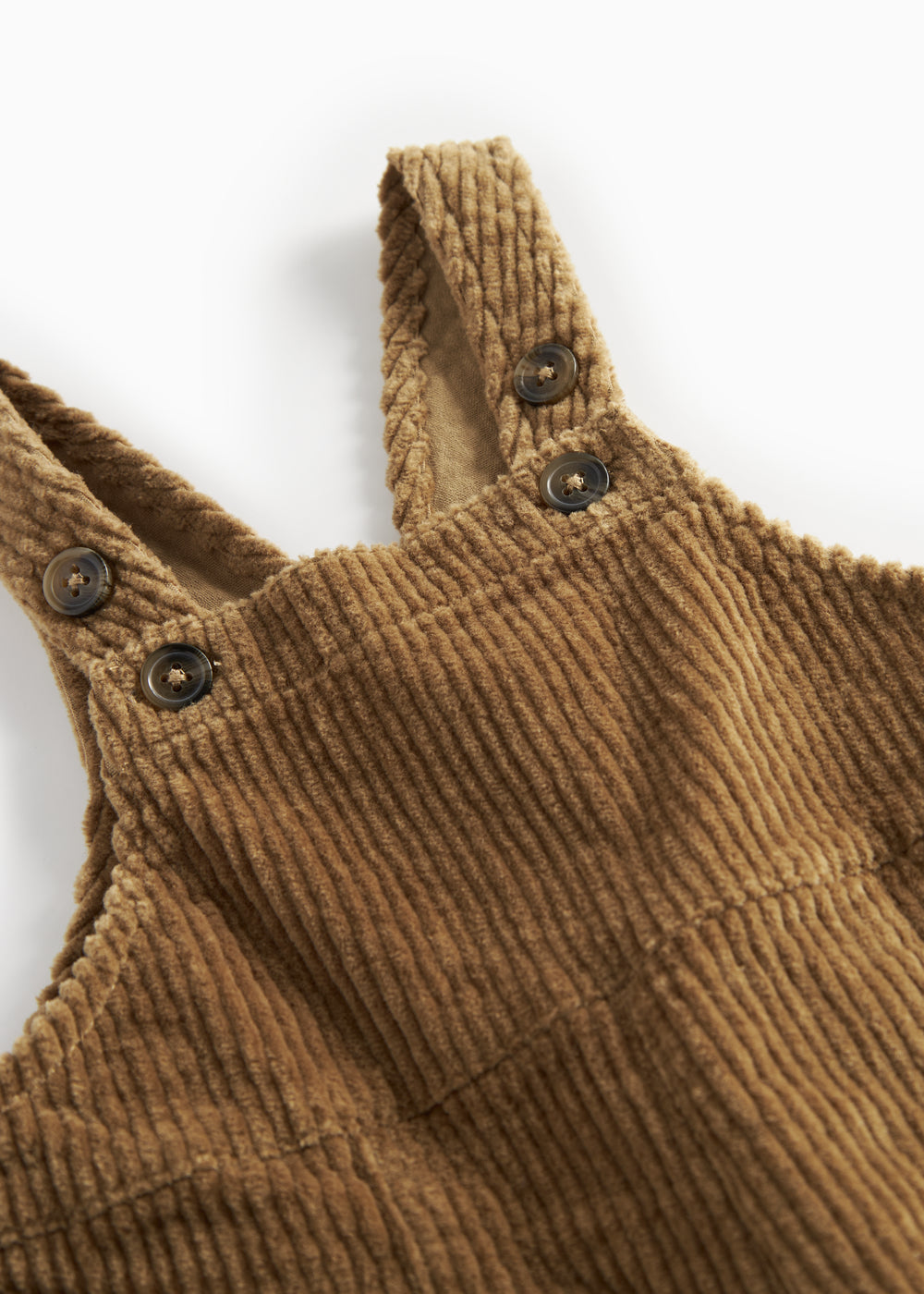Brun fløjlsoverall til børn med knapper på selerne