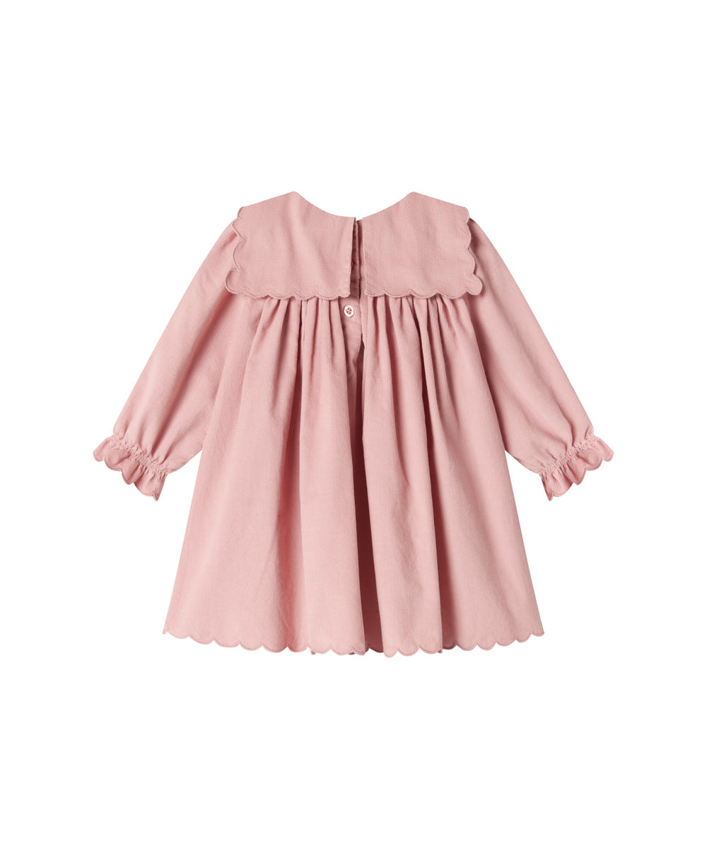 Lyserød babyfløjlskjole med lange ærmer, bølgekant og lommer til børn